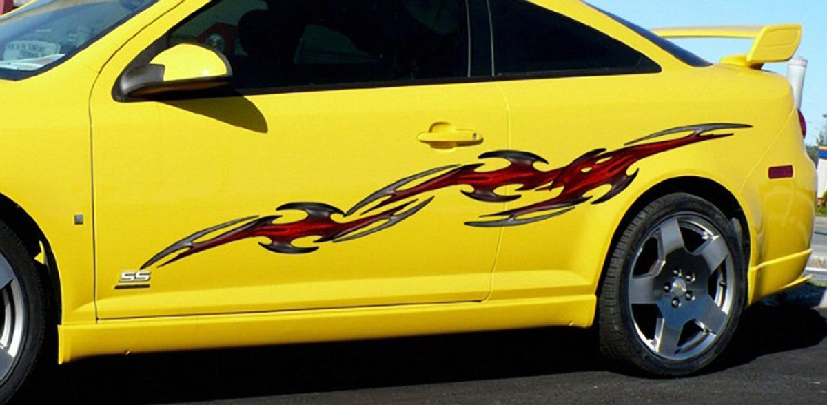 tribal decals on yellow sports car